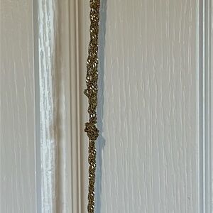 EUC gold-colored “knotted” necklace